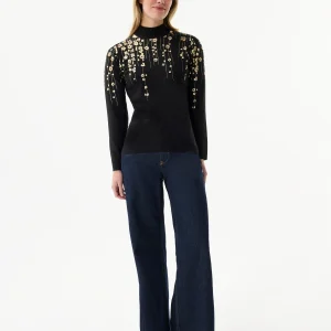 Pull à col montant motifs floraux dorés