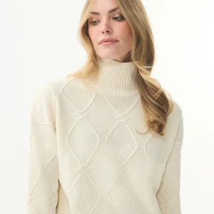 Pull écru à col montant et maille texturée