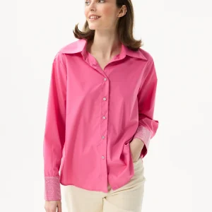 Chemise fuchsia à poignets strass
